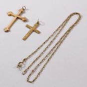 Gold cross stamped 9ct on chain tested to 14ct and a rose gold hollow cross stamped 9ct