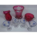 Set of four 20th Century with liqueur glasses with etched and blue overlay decoration,