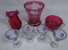 Set of four 20th Century with liqueur glasses with etched and blue overlay decoration,