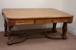 Large Victorian carved golden oak centre table, six frieze drawers on curved stretcher base, W183cm,