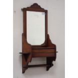 Edwardian walnut hall mirror, hinged glove box, carved pediment, W47cm, H71cm,