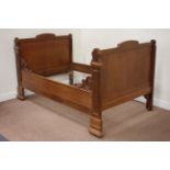 19th century French panelled oak single bedstead with carved scroll detail,