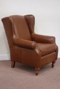 Next wing back armchair upholstered in brown leather Condition Report <a