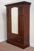 Edwardian walnut wardrobe enclosed by single mirrored door with drawer to base, W135cm, H205cm,