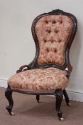 Quality Victorian rosewood nursing chair, spoon back, carved with berries and foliage,