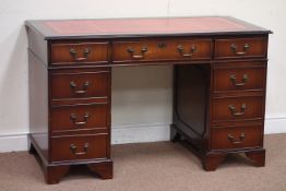 Reproduction mahogany twin pedestal desk, leather inset top, eight drawers, W122cm, H76cm,