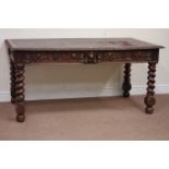 Victorian carved oak two drawer writing table with inset top on barley twist supports W154cm, D86cm,