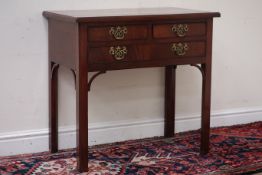 George III mahogany and mahogany banded lowboy, two short and one long drawer, W76cm, H72cm,