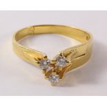 Three stone diamond off-set gold ring stamped 14K Condition Report <a