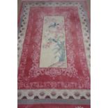 Chinese washed woollen pink ground rug,