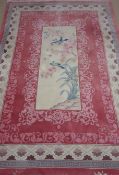Chinese washed woollen pink ground rug,