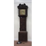 19th century carved oak longcase clock case, with eight day movement, polished brass dial,