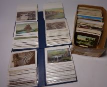 Three albums of Victorian and later Whitby related postcards and a box containing topographical and