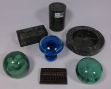 Polished stone desk set including calendar and abacus two Victorian glass dumps and a Mdina glass