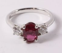 Oval ruby and brilliant cut diamond white gold ring hallmarked 18ct (ruby approx 2 carats)