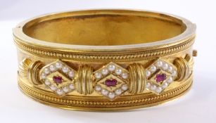 Victorian Etruscan ruby and seed pearl gold hinged bangle tested to 15ct approx 36gm