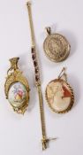 French yellow metal and porcelain miniature mourning pendant/brooch the pin stamped 9ct,