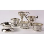 Two small silver trophies and four napkin rings hallmarked approx 4.