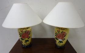 Pair of large porcelain table lamps decorated with roses,