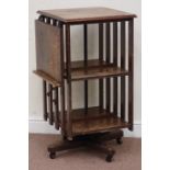 Early 20th century oak two tier revolving bookcase, 50cm x 54cm,