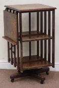 Early 20th century oak two tier revolving bookcase, 50cm x 54cm,