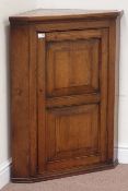 20th century oak corner cabinet, single fielded panelled door, W75cm,