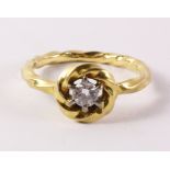 Gold rope twist ring with diamond in halo setting tested to 18ct (diamond approx 0.