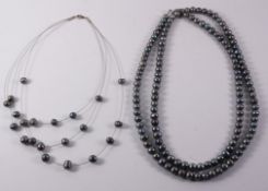 Grey freshwater pearl necklace 104cm and a three strand wire and grey pearl necklace
