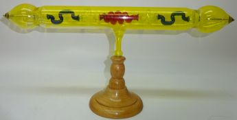 20th century Geissler Tube, yellow tinted vessel with coloured glass interior,