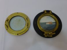 Brass single lug porthole with cast surround, D27cm & a brass porthole with screw cover,
