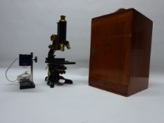 Black lacquer and brass 'Service' monocular microscope W.