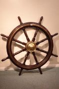 Large brass bound eight spoke ship's wheel with brass hub,