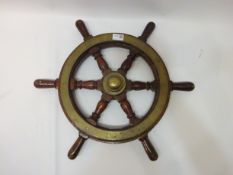 Small brass bound oak six spoke ship's wheel with brass hub D57cm Condition Report