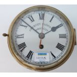 Brass ship's bulk head timepiece, dial inscribed Prescot Clock Co.