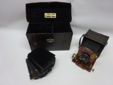 A Thornton Pickard 'Folding Ruby' 1/4 Plate Camera, with black leather covered body,