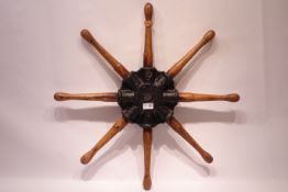 Cast iron and oak eight spoke ship's wheel,