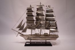 Unusual brushed metal model of a three masted whaler, on fixed display stand,