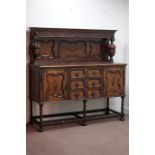 Early 20th century oak barley twist sideboard with raised panelled back, carved baluster supports,
