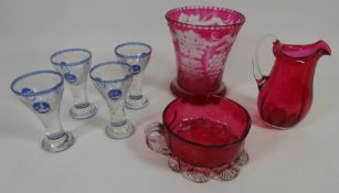 Set of four 20th Century with liqueur glasses with etched and blue overlay decoration,