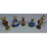 Four Royal Doulton Bunnykins figurines and a Beswick 'Mad Hatter' figurine (4) Condition