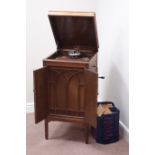 Early 20th century 'His Master's Voice' oak cased gramophone with records, W47cm, H92cm,