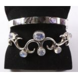 Abalone set hinged silver bracelet hallmarked and a stone set bangle stamped 925
