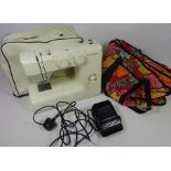 Janome electric sewing machine and accessories Condition Report <a