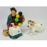 Royal Doulton 'The Old Balloon Seller' and a Beswick Jack Russel Terrier (2) Condition