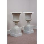 Pair Victorian style white finish Campania urns on plinths, W35cm,