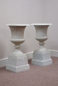 Pair Victorian style white finish Campania urns on plinths, W35cm,