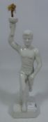 Porcelain figure of a torchbearer from the 1936 Berlin Olympics,