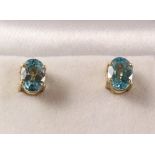 Pair of aqua coloured stone set stud ear-rings stamped 9k Condition Report <a