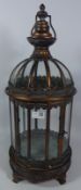 Burnished metal antique style glass lantern,