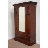 Edwardian walnut wardrobe enclosed by single mirrored door with drawer to base, W135cm, H205cm,